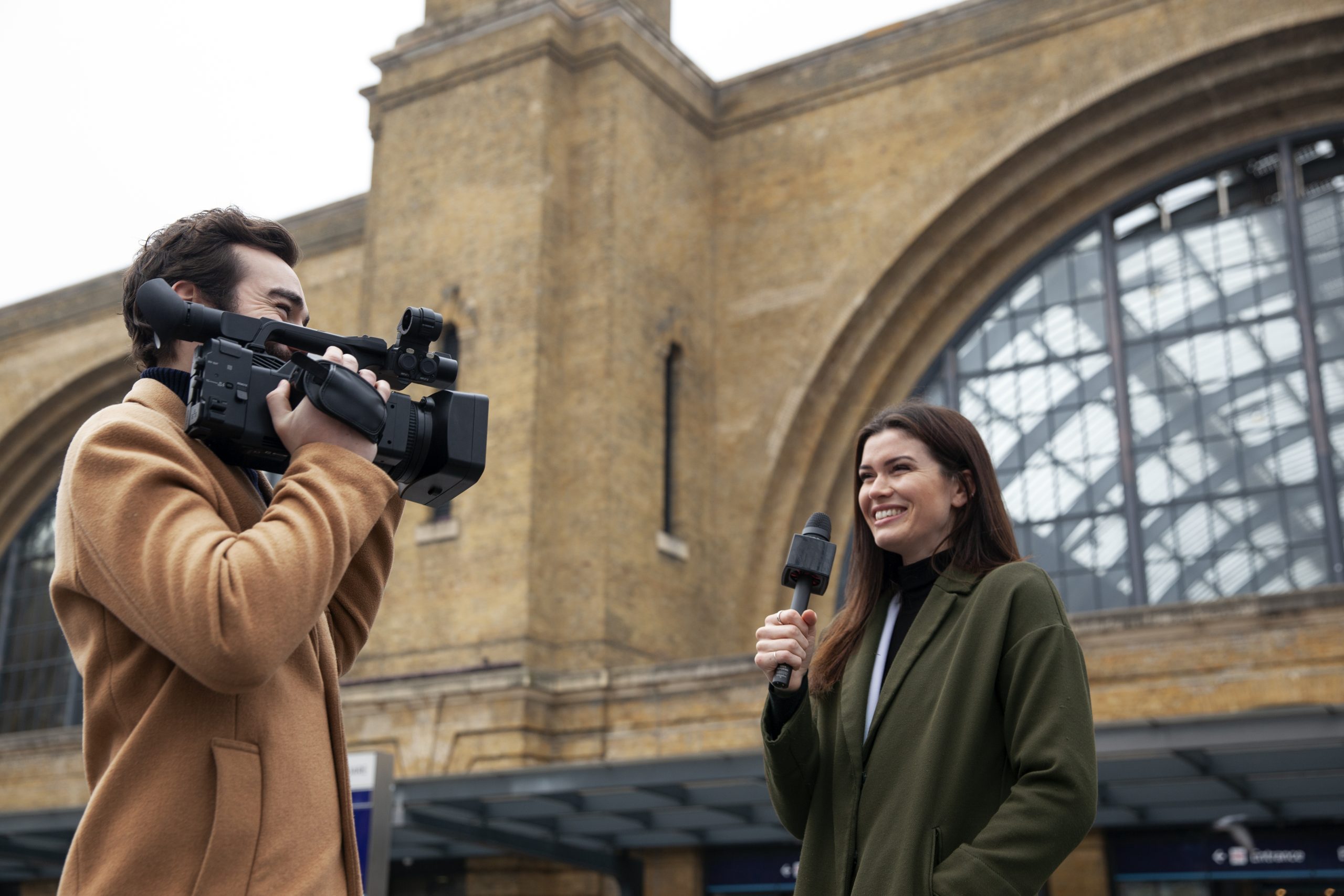 medium-shot-man-holding-camera